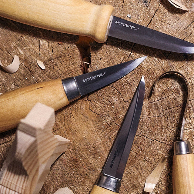 Set of hand tools on a wooden surface